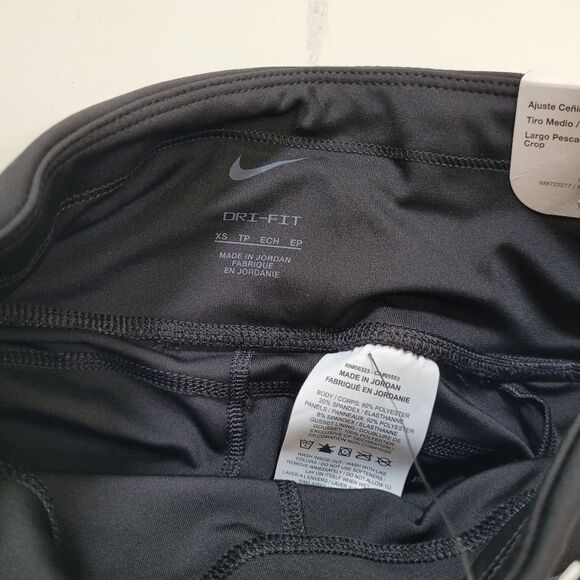 NEW NIKE FAST DRI-FIT BLACK MID RISE CROPPED LEGGINGS TIGHTS ZIP POCKETS XS NWT - Picture 5 of 10